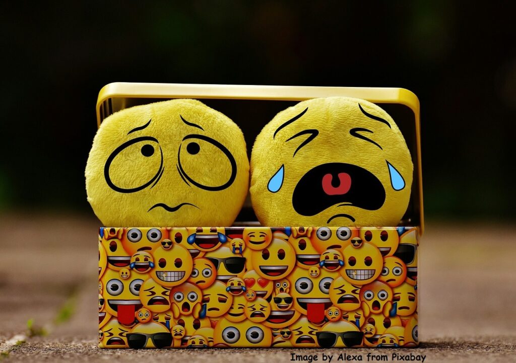 why do babies cry? Crying emoji and baffled mom